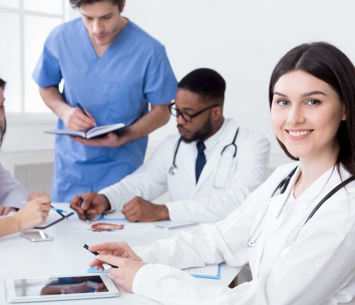 team-of-doctors-having-meeting-in-medical-office-24TWHC6.jpg